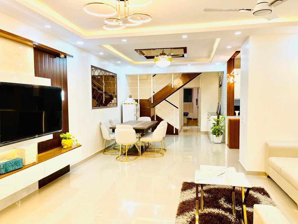 Premium interior design Bangalore — open living and dining